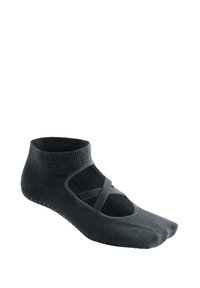 Black low-cut socks with crisscross straps, textured surface, and rubber grip dots on the bottom for added traction.