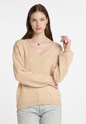 Beige neulepaita V-pääntiellä, jossa on brodeerattuja valkoisia kukkia. Ribbattu hihansuu ja helma, rento malli, pehmeä tunne.