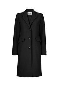 Manteau noir mi-long avec col à revers, trois boutons sur le devant et deux poches à rabat, conçu par Modström.