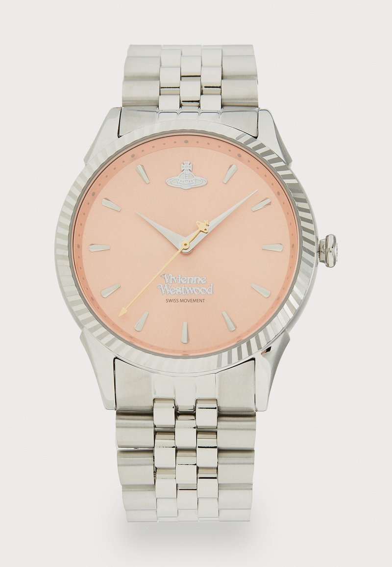 Kruhové strieborné nerezové hodinky s ružovým ciferníkom, striebornými ručičkami, hodinovými značkami a textúrovaným rámčekom. Nerezový náramok s kovovými článkami.