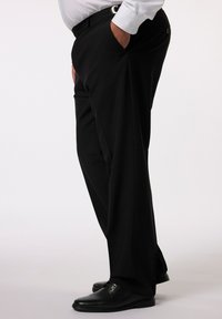 Pantalones de vestir negros con un diseño de pierna recta, que cuentan con una textura suave, bolsillos laterales y un cierre de botón en la cintura.