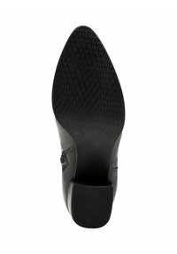 Czarna podeszwa buta z teksturowanej gumy, z gładkim, zaokrąglonym czubkiem i małym obcasem, oznaczona rozmiarem 36.