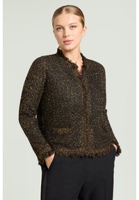 Sort og guld, tekstureret cardigan med lange ærmer, frynsede kanter og en hakket krave, med lommer og tætsiddende pasform.