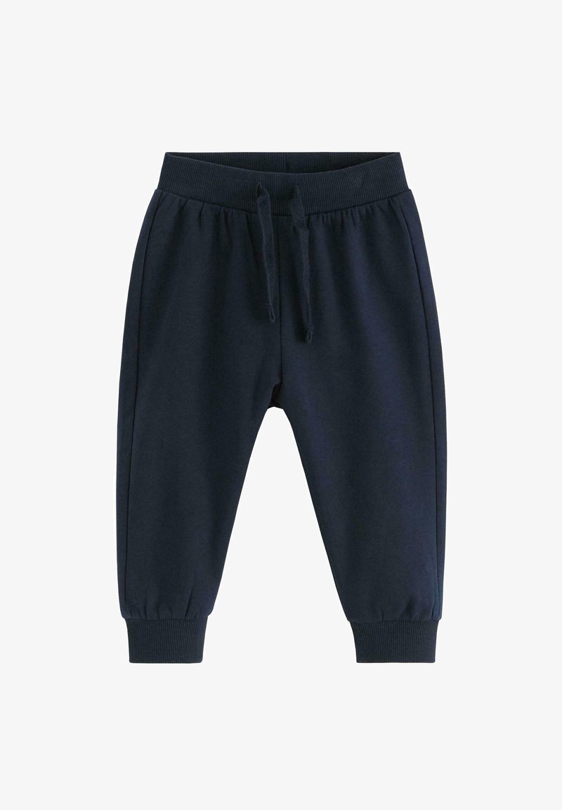 Granatowe spodnie dresowe wykonane z mieszanki bawełny, z elastycznym paskiem w talii z troczkami i ściągaczami u kostek, co zapewnia dopasowany krój.