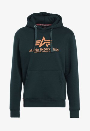 Felpa con cappuccio verde scuro in tessuto morbido, dotata di tasca a marsupio, cappuccio regolabile con cordino e logo grafico arancione sul fronte.