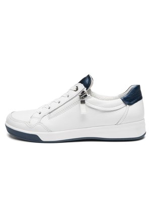 White low-top sneaker with navy heel patch, side zipper, lace-up front, and navy sole accents.