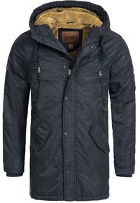 Parka marine à capuche avec une doublure jaune pelucheuse, poches à pression et zippées à l'avant, capuche avec cordon de serrage et tissu texturé.
