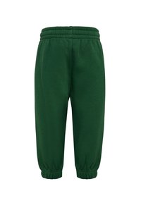 Gröna sweatpants med elastisk midja och mudd, med en slät yta utan fickor eller synliga sömmar.