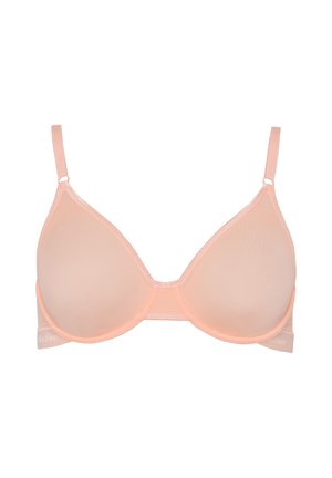 Light peach bra with smooth, molded cups, adjustable straps, and mesh detailing. Features elastic band with logo on the side.
