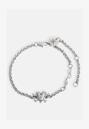 Stříbrný náramek s řetízkem, zdobený designem srdce a lebky, leštěný povrch, nastavitelná délka s uzávěrem a značkovou visačkou.