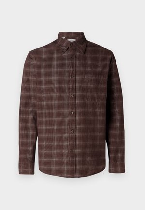 Camicia a maniche lunghe a quadri marroni con colletto abbottonato, dotata di taschino sul petto e vestibilità comoda. Realizzata in un tessuto testurizzato.