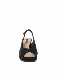 Sandal con zeppa slingback nera con punta aperta, accenti decorativi in perline, tomaia in materiale simile alla pelle liscia e soletta imbottita di colore chiaro.