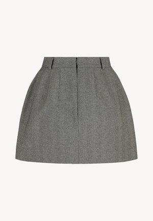 Grijze houndstooth rok met een uitlopende silhoutte, met plooien, zijzakken en een verborgen ritssluiting aan de achterkant. Gegevens met een textuurafwerking.
