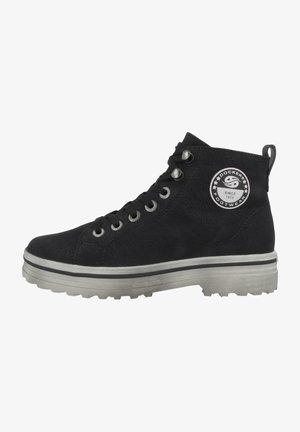 Black high-top sneakers with textured material, round toe, lace-up front, metallic eyelets, and a logo patch on the side. Thick rubber sole.