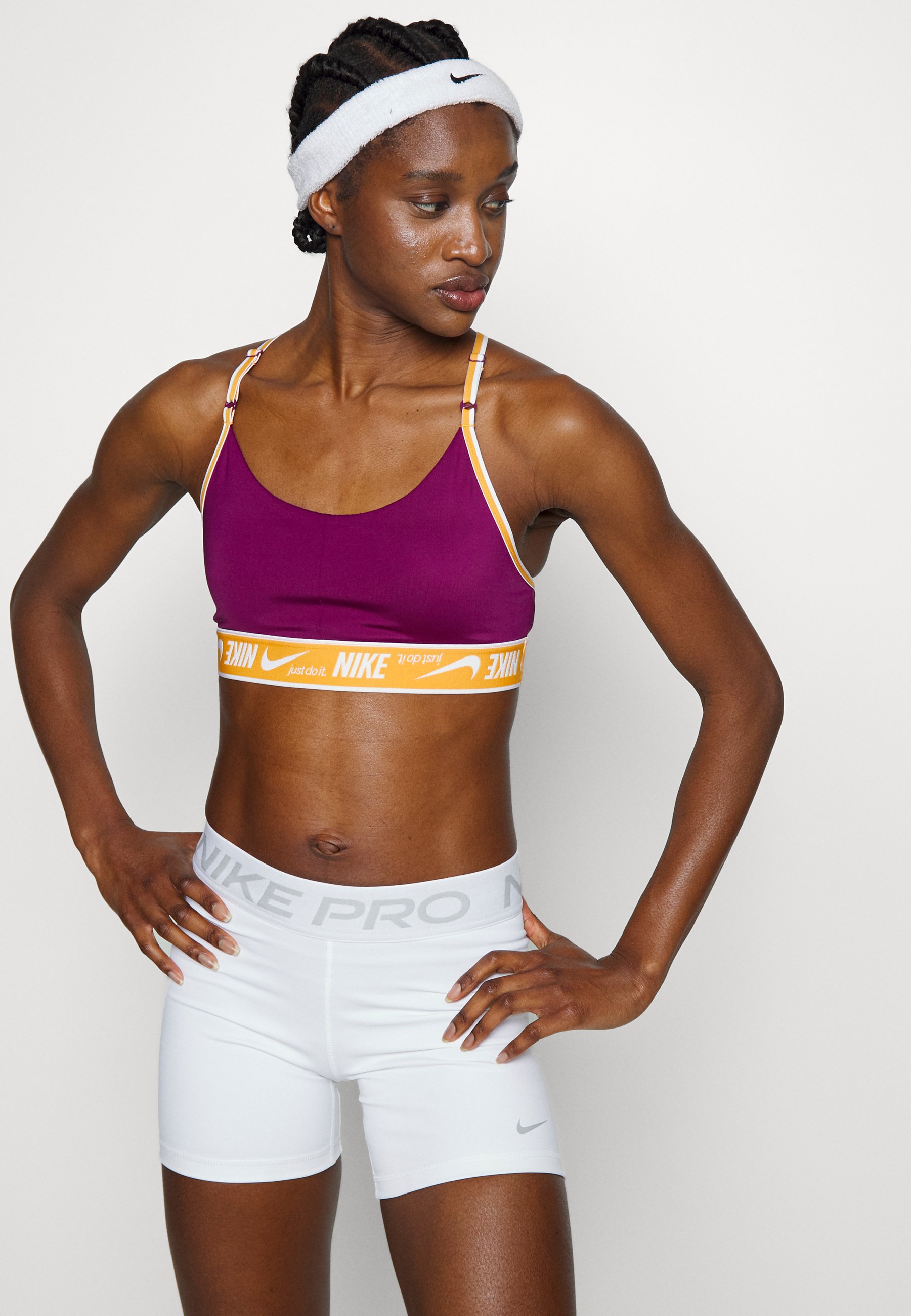 Nike Performance INDY LOGO BRA - Sport-bh met light support - sangria/light  curry/white/paars - Zalando.be