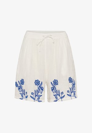 Balti medvilniniai šortai su elastine liemene ir raišteliu, puoštų mėlynu gėlių siuvinėjimu palei apatinę abiejų kojų kraštą.