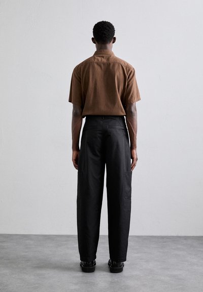 Han Kjøbenhavn TROUSERS - Hlače - black