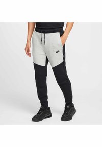 Nike Sportswear - Tracksuit bottoms - black dark grey heather black Thumbnail Image 1