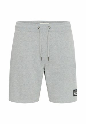 Pantalones cortos de algodón grises que cuentan con una cinturilla elástica con cordones, bolsillos laterales y un parche de logo negro en la pierna izquierda.