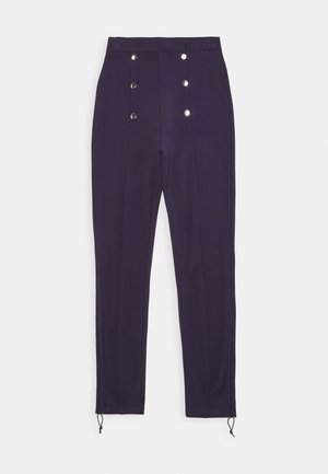 Purple fitted pants with a high waist, featuring five silver buttons along the front, two side pockets, and adjustable ankle ties.