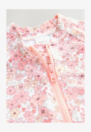 Flickbadkläder med blommig tryck i rosa och pastellfärger, med en framdragkedja och en hög krage designade i elastiskt material.