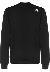 Černá mikina s dlouhými rukávy s žebrovanými manžetami a lemem, na horní pravé straně zad malý bílý nápis "The North Face".