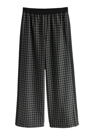 Loose-fit pants with black and gray checkered pattern, elastic waistband, and solid black side stripes.