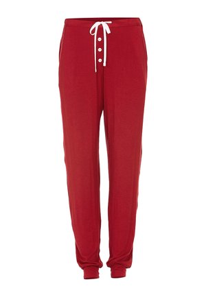 Rode joggers gemaakt van zachte stof, met een trekkoord in de taille, een vierknopen front en elastische enkelboorden.