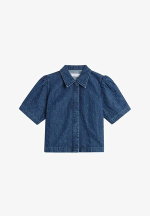 Tummansininen farkkupaita lyhyillä puffi-hihnoilla, kärjellinen kaulus ja napit edessä. Täydentää näkymää hienovarainen tekstuuri koko paidassa.