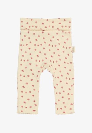 Kerged kreemja värvuse ja väikese roosa lillemustriga leggingsid, pehme puuvillane materjal, elastne vöökoht ja sakilise äärisega pahkluudes.