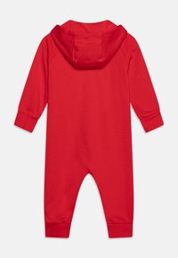 adidas Performance UNISEX jasnoczerwony