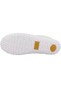 Sole of a shoe with a textured white rubber surface, featuring a brown accent near the heel and a yellow brand logo embedded.