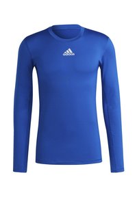 Lange mouw blauwe sportshirt gemaakt van gladde stof. Beschikt over een ronde hals en een wit Adidas-logo op de borst. Eenvoudig ontwerp.