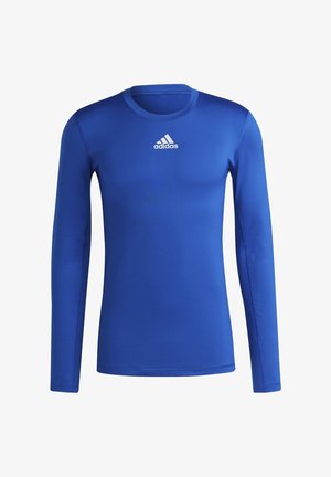 Langärmliges blaues Sportshirt aus glattem Stoff. Verfügt über einen Rundhalsausschnitt und ein weißes Adidas-Logo auf der Brust. Einfaches Design.