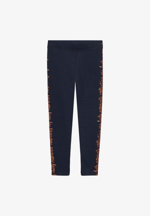 Leggings marine en tissu mélangé de coton avec un design textuel orange sur les côtés, dotés d'une taille élastique et d'une coupe slim.