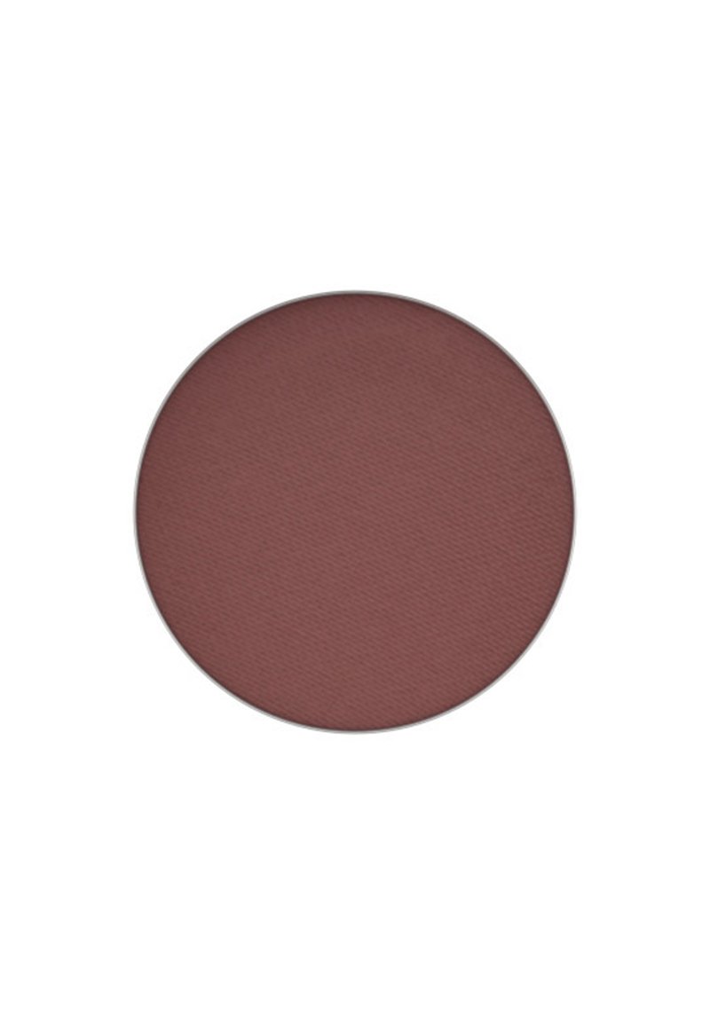 Une palette de blush ronde dans une couleur mauve douce, avec une finition texturée, sur fond blanc uni.