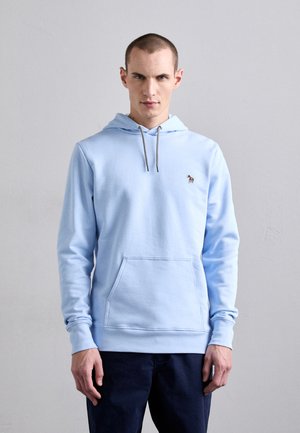 Light blue hooded sweatshirt made of soft material, featuring a front pocket, drawstring, and a small embroidered logo.