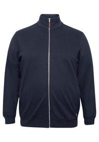 Sweatshirt zippé bleu marine en mélange de coton, avec un col montant, des manches longues, des poignets et un ourlet en ribbed, et un détail de logo subtil.