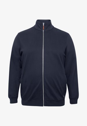 Sudadera con cremallera de color navy, confeccionada en una mezcla de algodón, con un cuello alto, mangas largas, puños y dobladillo acanalados, y un detalle sutil del logo.