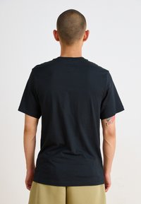 Nike Sportswear TEE - Print T-shirt - black