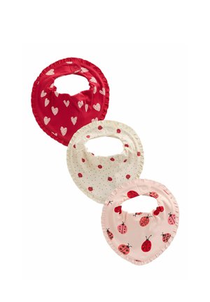 Three round baby bibs with snap closures, one red with white hearts, one white with red ladybugs, and one pink with red and black ladybugs.
