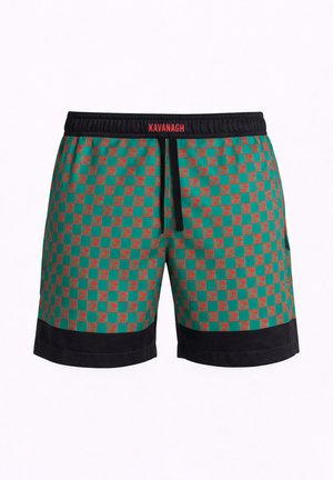 Costume da bagno da uomo a quadri verdi e rossi con cintura e orlo neri, con la scritta "KAVANAGH" in rosso sulla cintura.