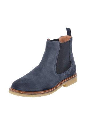 Navy blue suede Chelsea boot with elastic side panels, tan lining, pull tab at the back, and a light brown crepe sole.