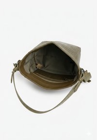 Olive green, textured handbag with a triangular shape, featuring an interior zip pocket and a long adjustable strap.