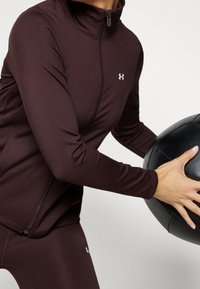 Under Armour Trainingsjacke - brown