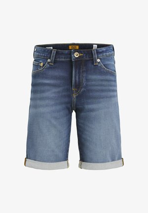 Denim kratke hlače v srednje modrem pranju z zavihanimi robovi. Imajo pet žepov, rumeno stikalo in kovinsko zapiranje. Oznaka blagovne znamke je vidna.