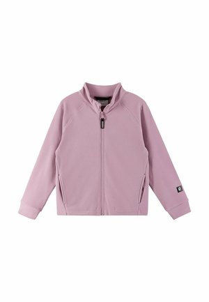 Veste zippée rose clair avec un col haut, des manches raglan, deux poches latérales et un petit patch logo sur la manche gauche. Tissu doux et texturé.