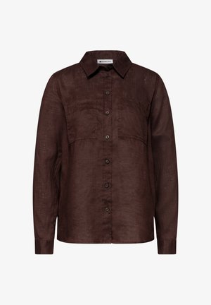 Chemise à manches longues marron foncé, boutonnée, avec deux poches poitrine et un col classique, en tissu texturé.