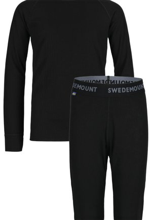 Schwarzes, geripptes Thermo-Set bestehend aus einem Langarmoberteil und Leggings, mit einem elastischen Taillenbund, der mit "SWEDEMOUNT" gekennzeichnet ist.