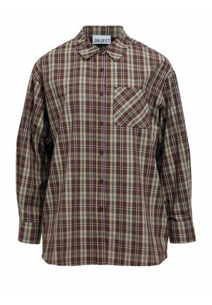 Chemise à carreaux marron avec col et boutons, présentant des accents beige et blanc, et une poche poitrine gauche. Fabriquée en tissu tissé.